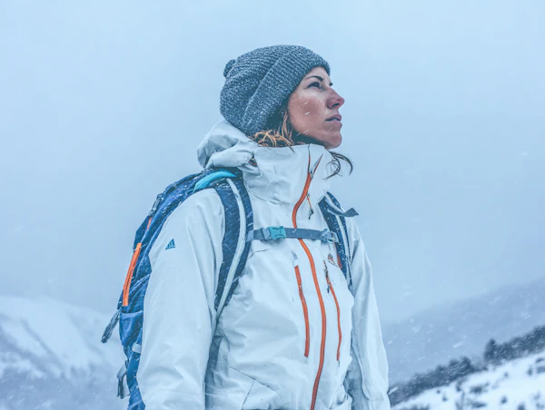 Explorer in Snowy Scene