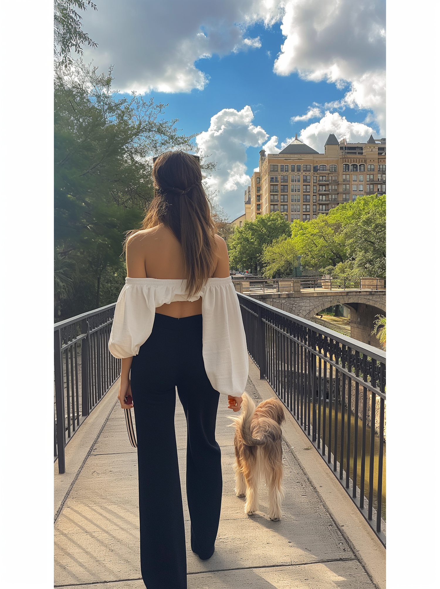 Woman and Dog on City Bridge