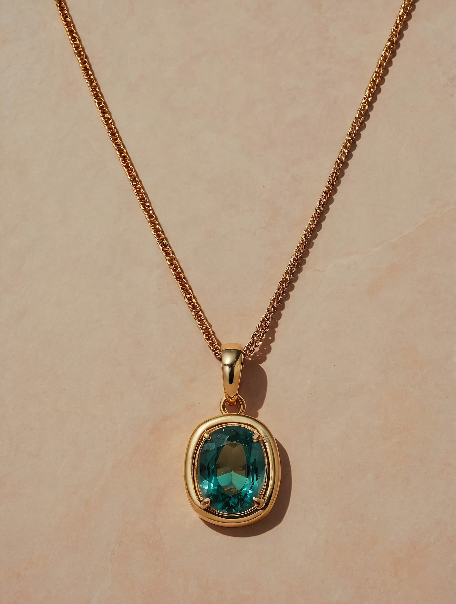 Gold Necklace with Teal Gemstone Pendant