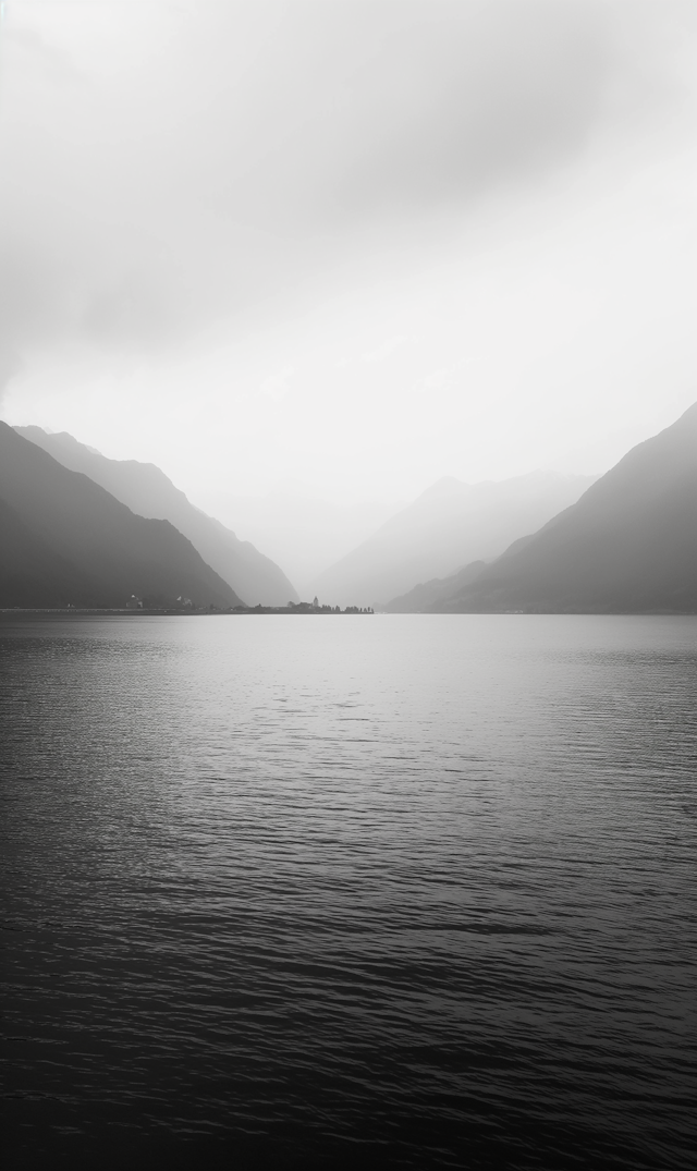 Tranquil Monochromatic Lake and Mountains