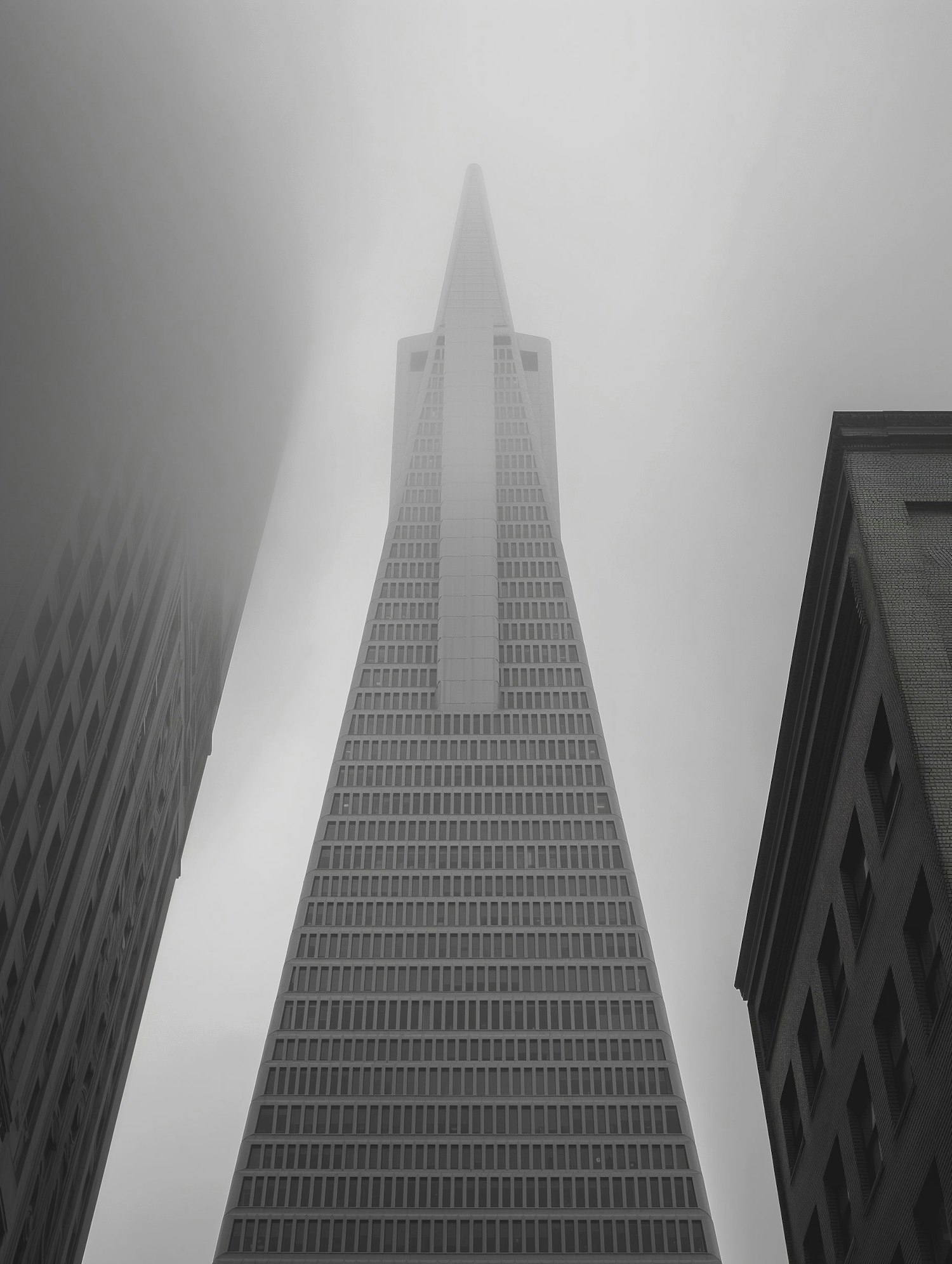 Ethereal Skyscraper in Mist