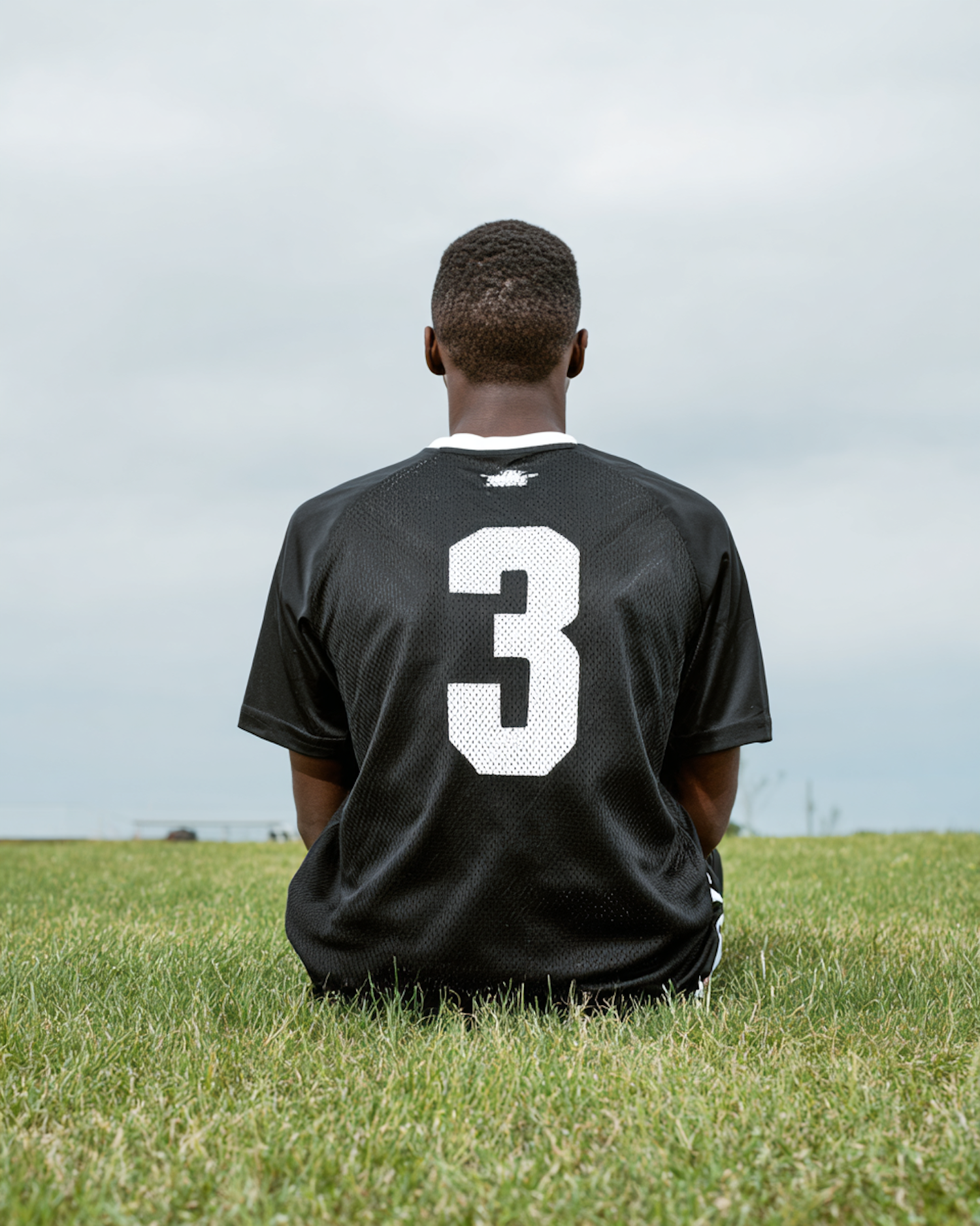 Person on Grassy Field