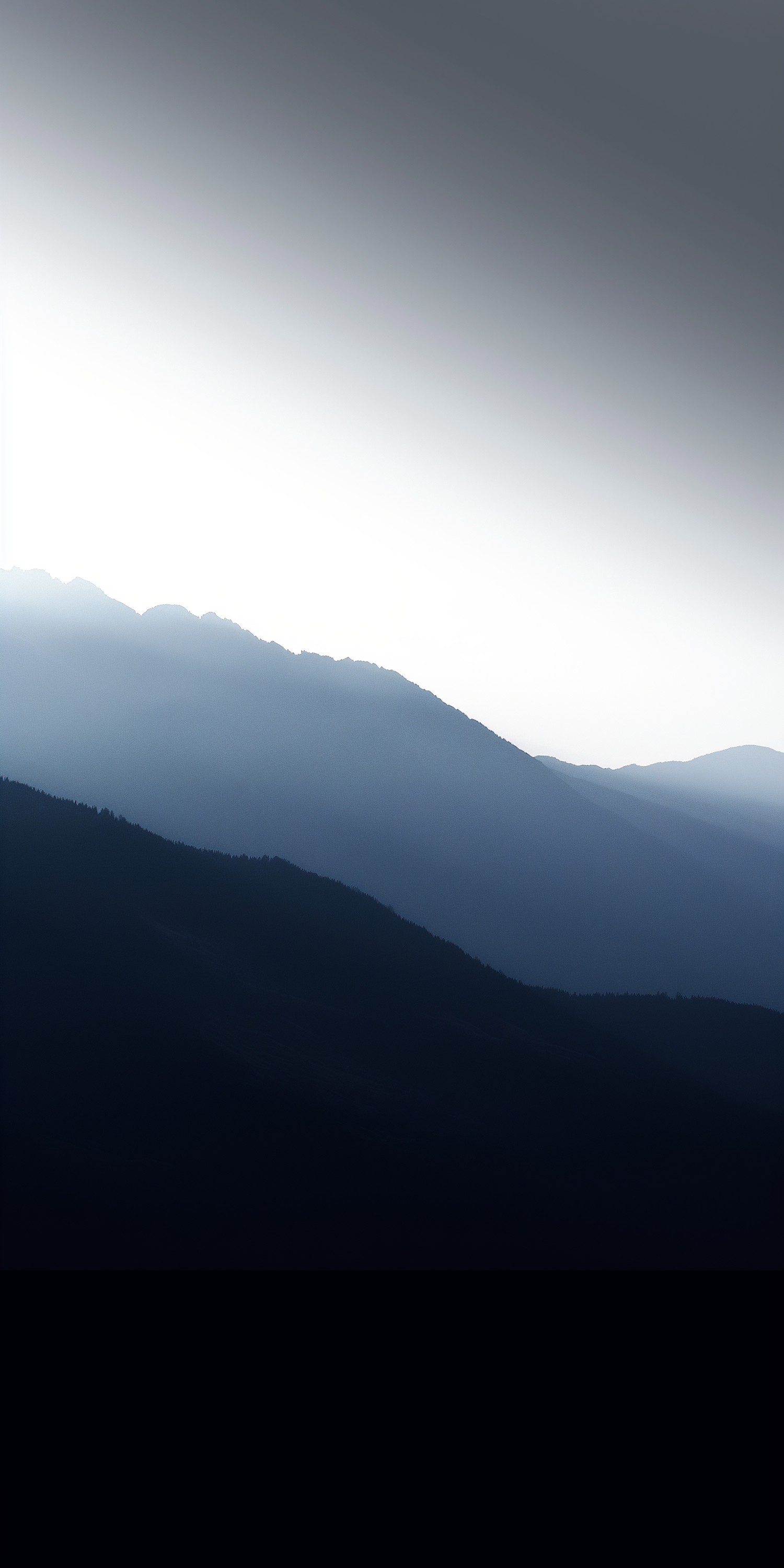 Tranquil Mountain Silhouettes at Sunrise/Sunset