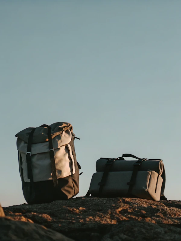 Backpacks on Rocky Surface