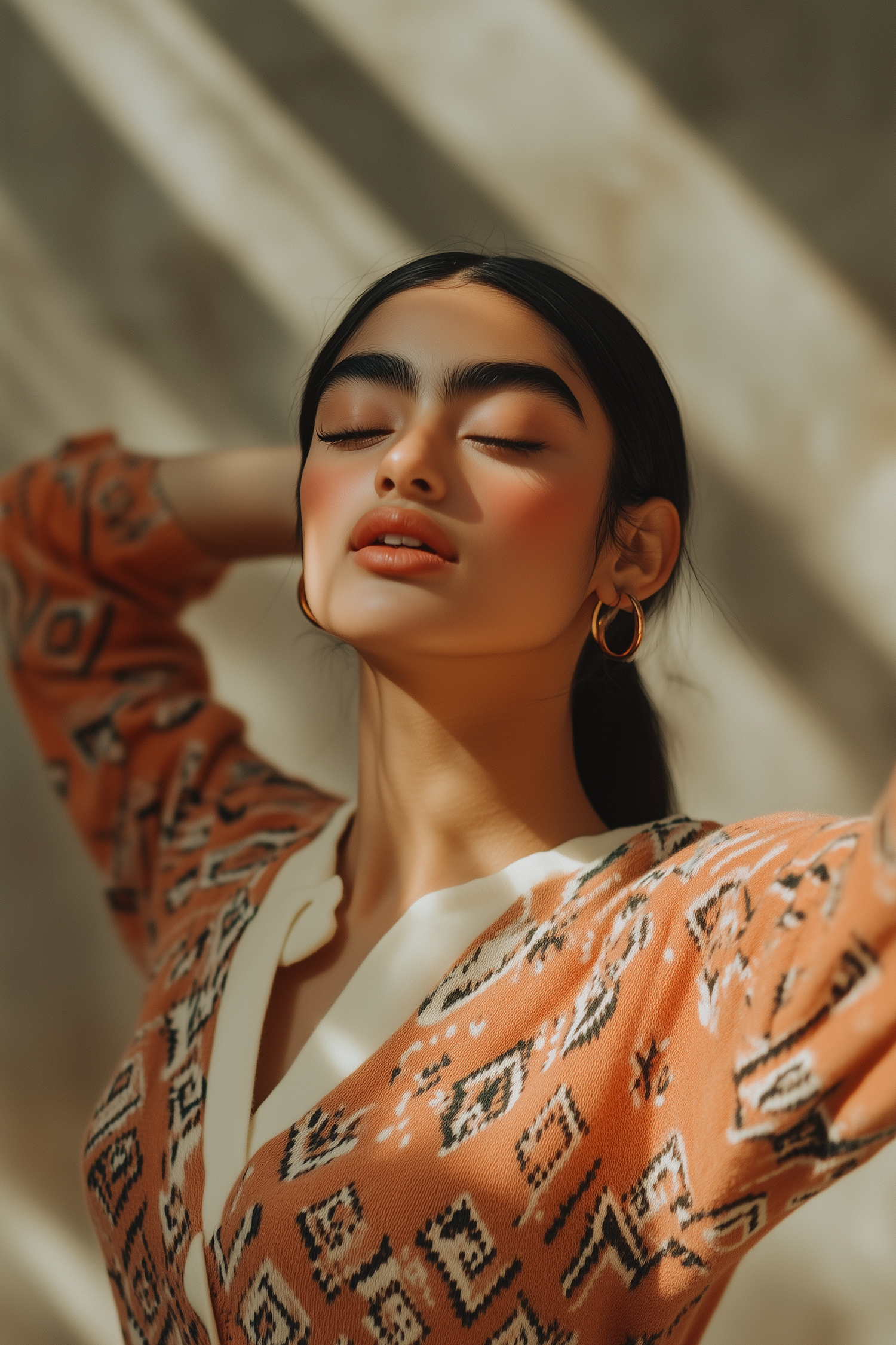 Serene Young Woman with Gold Hoop Earrings