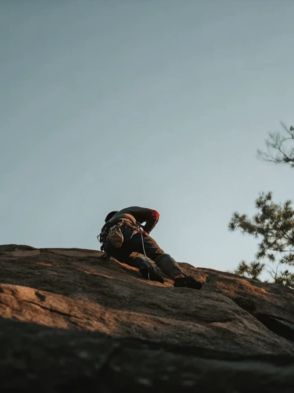 Climber On Rock Face
