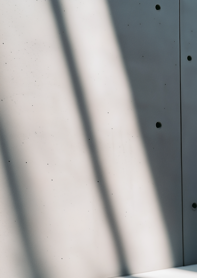 Minimalist Concrete Wall with Shadows