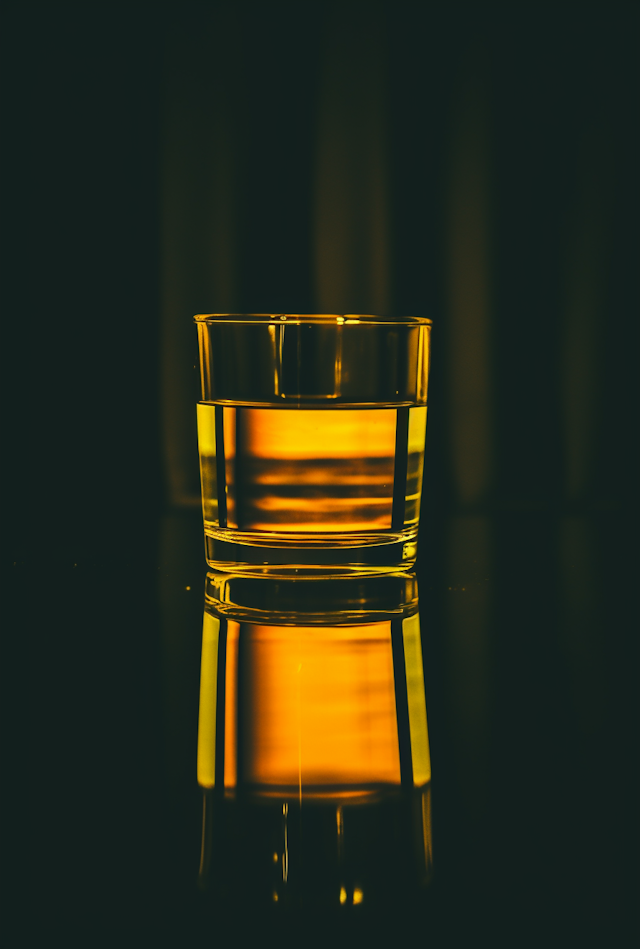 Solitary Reflection: Whiskey in Glass