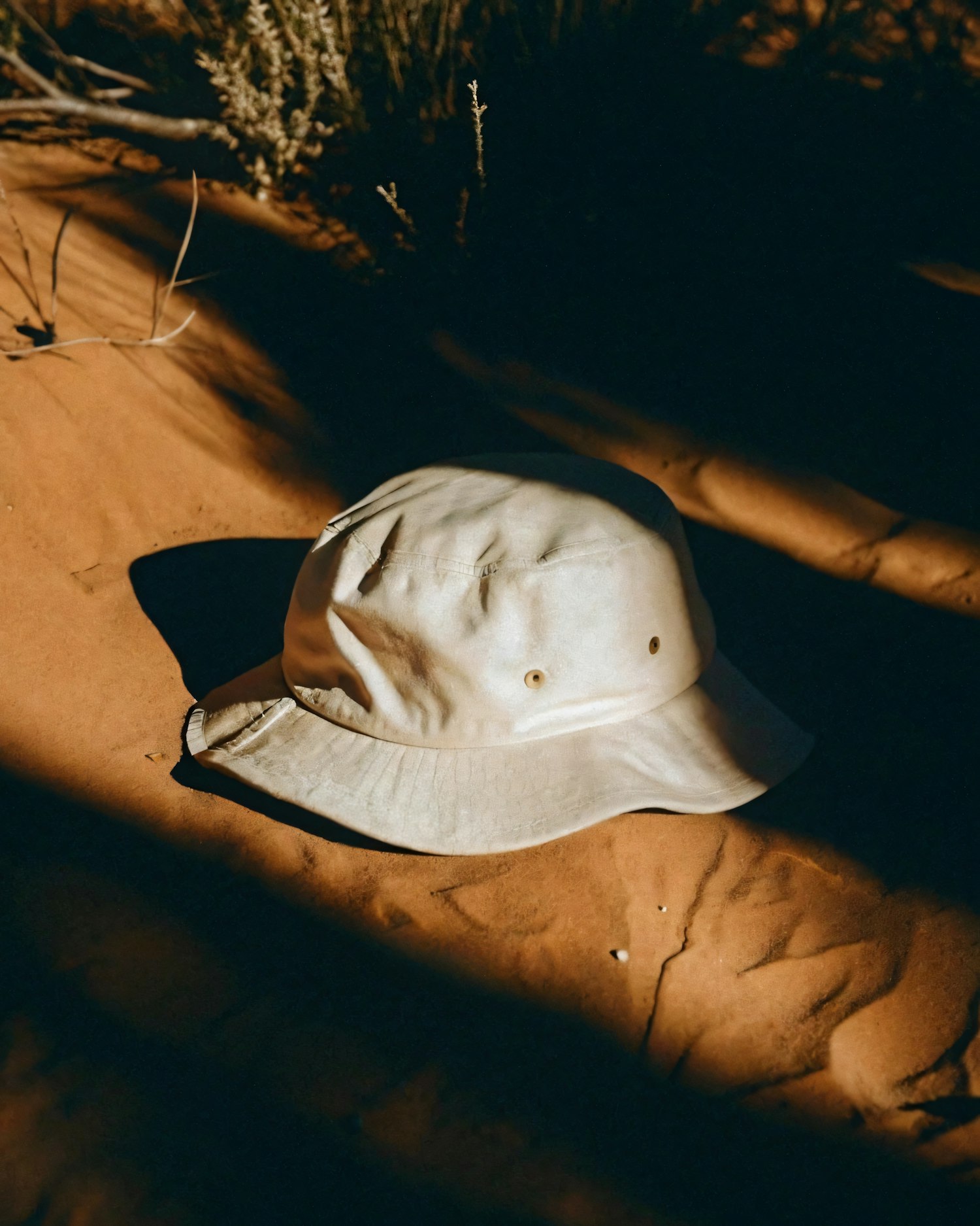 Bucket Hat on Sandy Surface