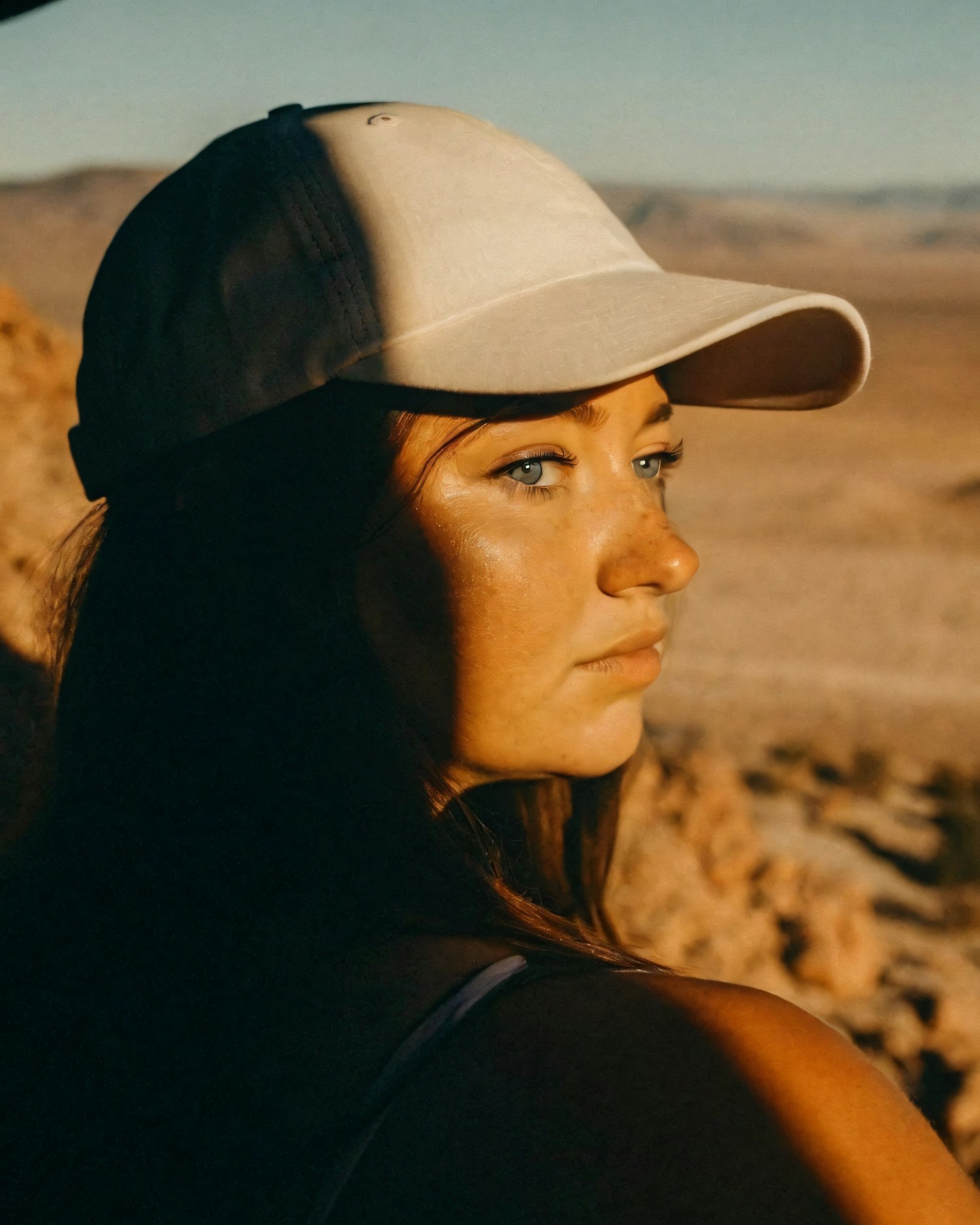 Contemplative Woman in Sunlight