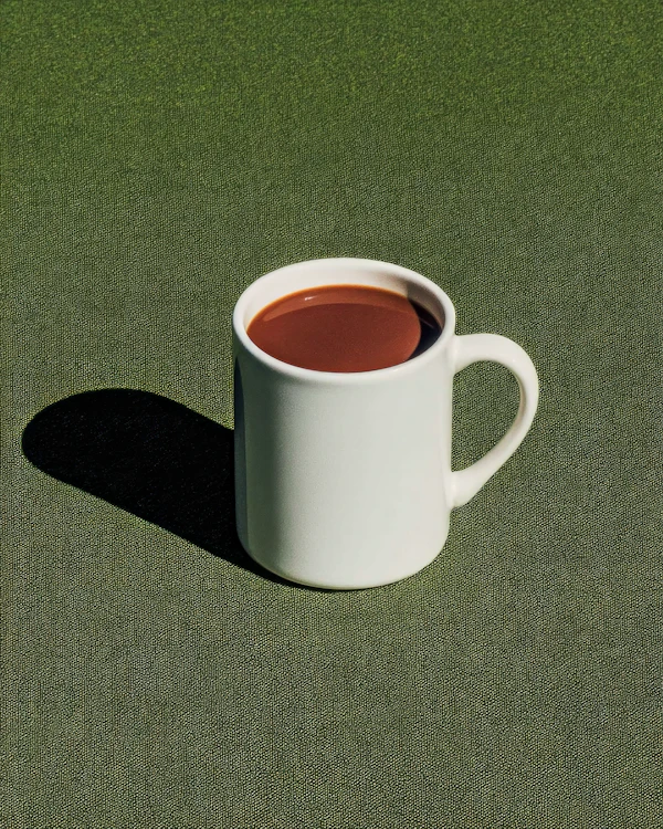 White Mug on Green