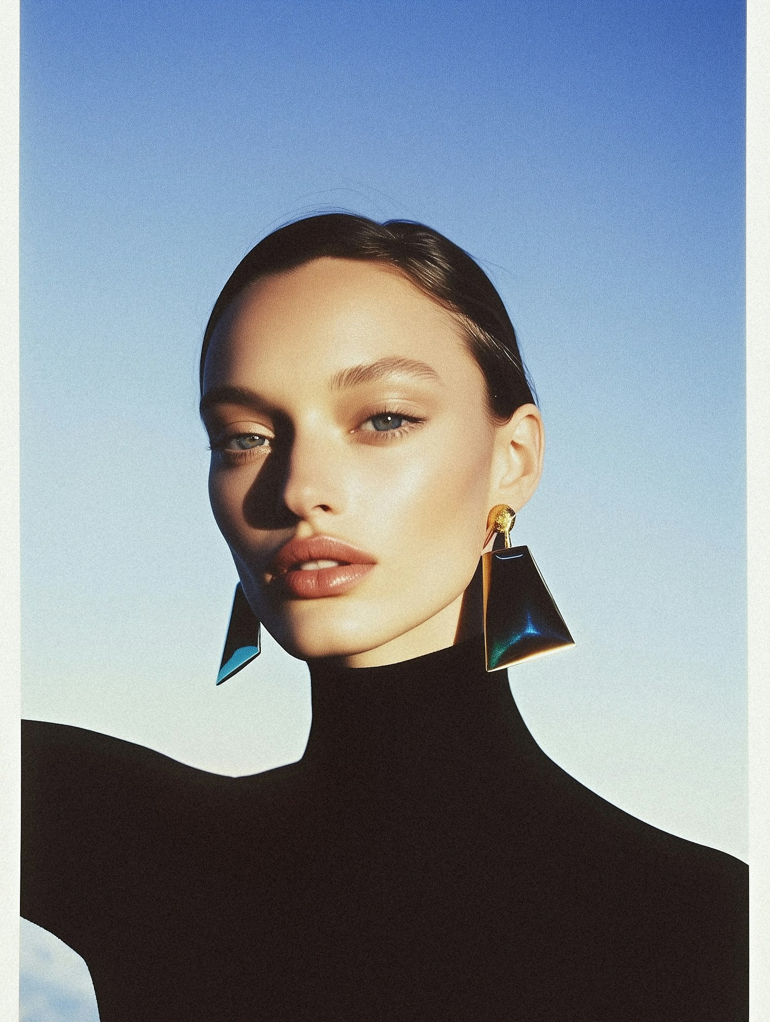 Serene Portrait with Geometric Earrings