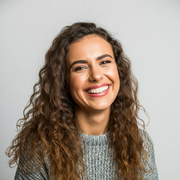 Smiling Woman in Grey Sweater