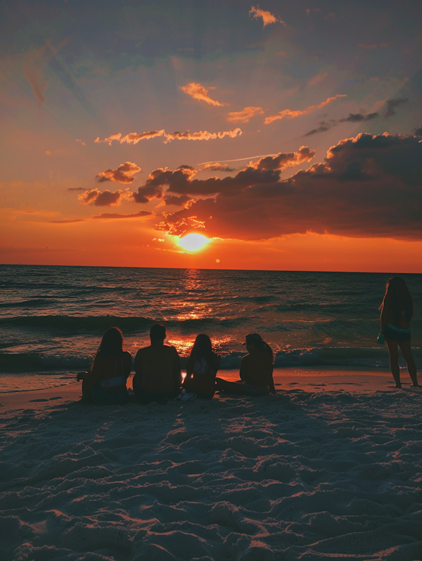 Serene Beach Sunset with People