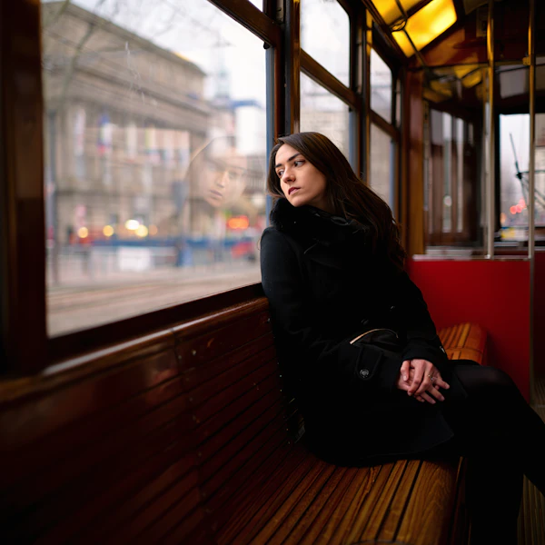 Woman on Tram Bench