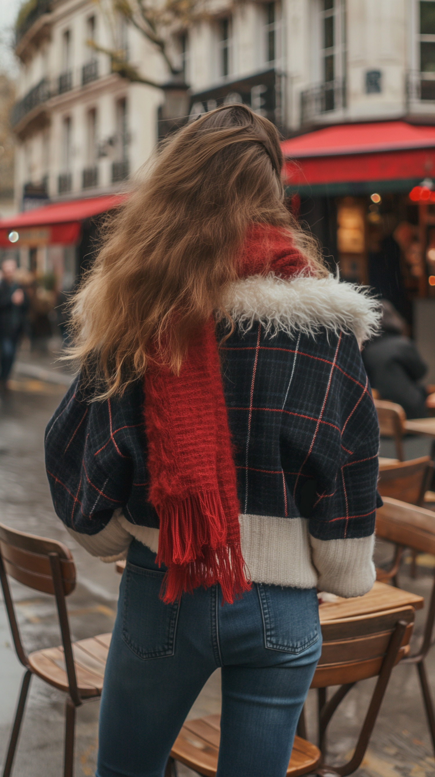 Woman in Plaid Coat at City Café