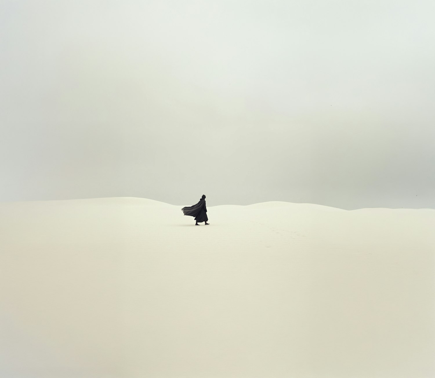 Solitary Figure in Sand Dunes