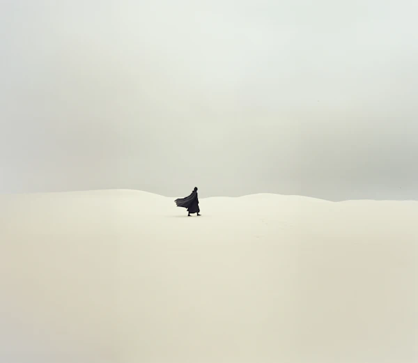 Solitary Figure in Sand Dunes