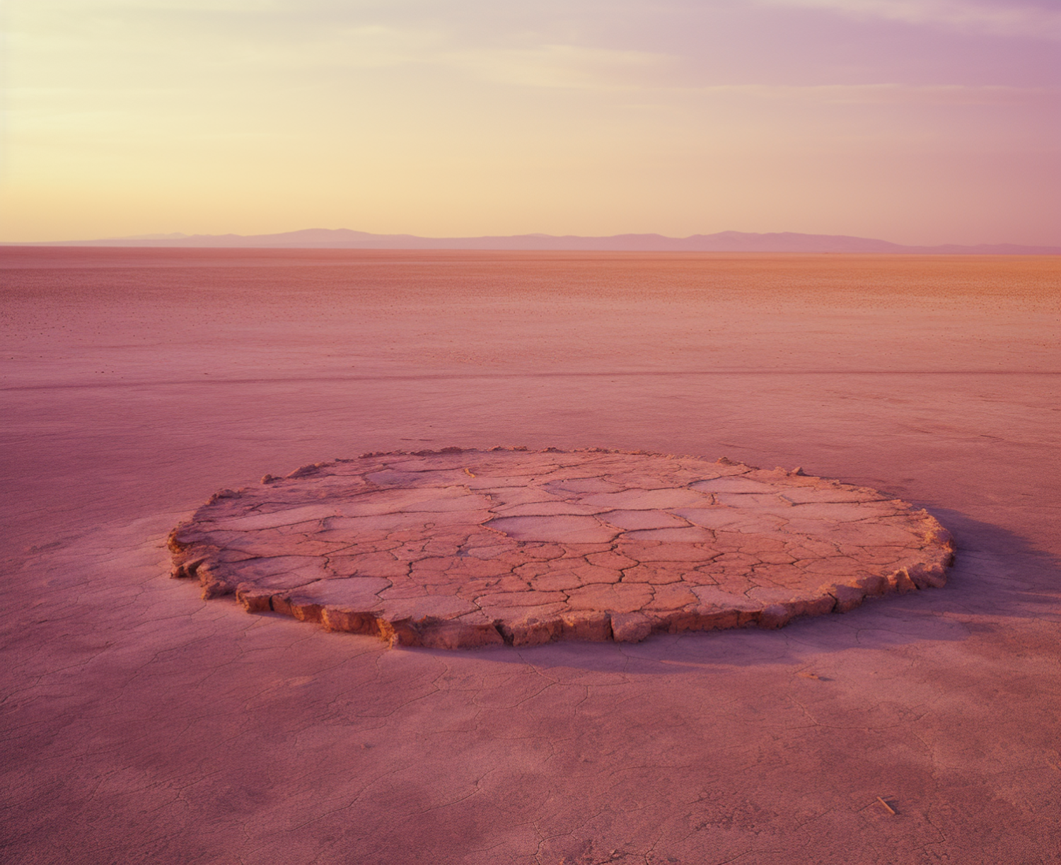 Sunset over Ethereal Circle of Cracked Earth