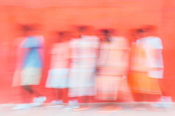 Blurred Orange Figures