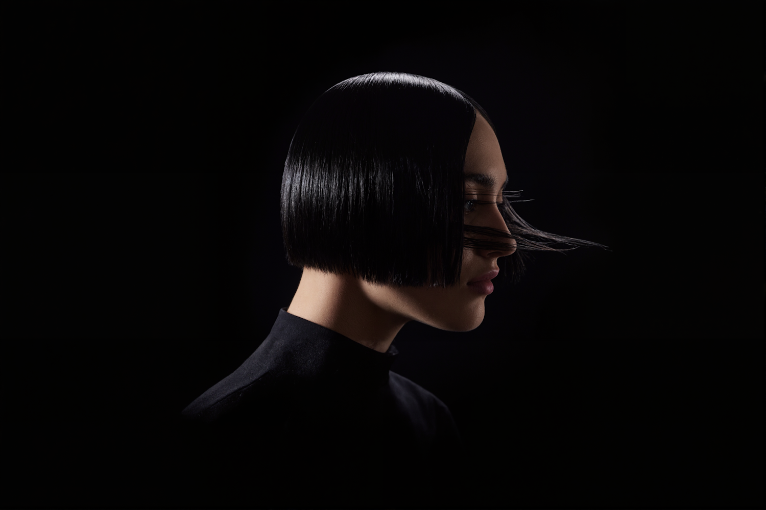 Profile of Person with Black Bob Haircut