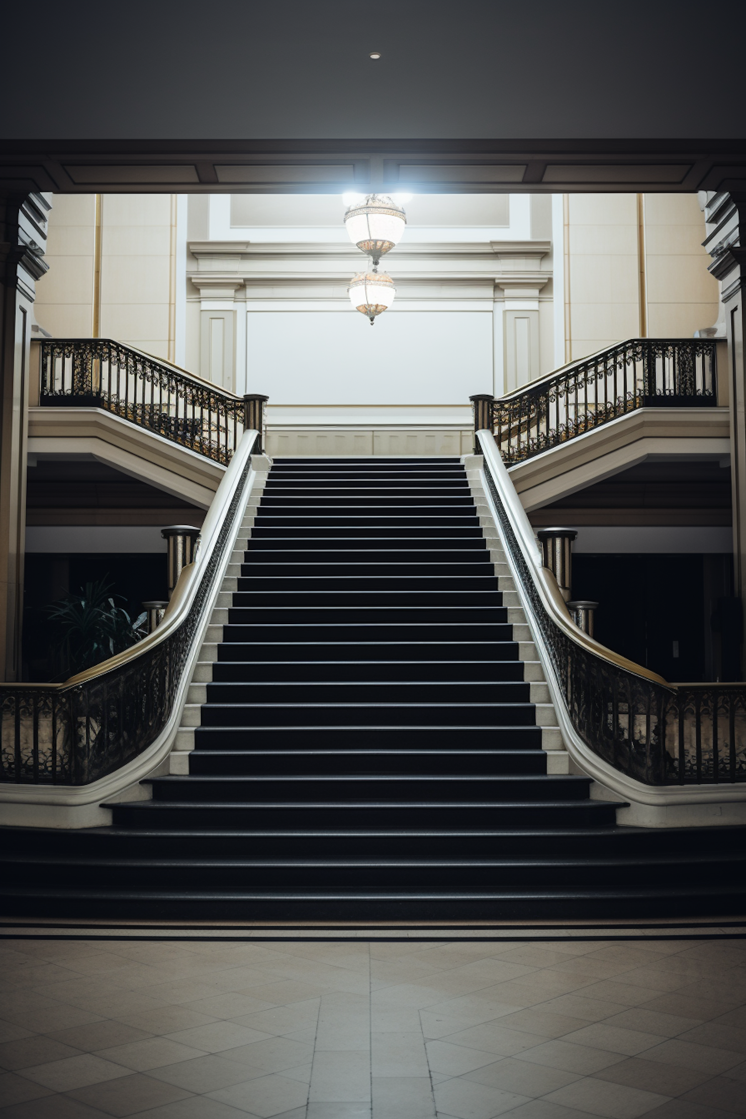 Elegant Symmetrical Grand Staircase with Chandelier