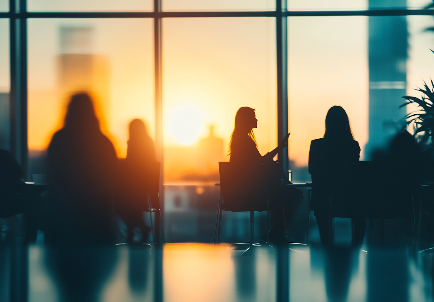 Silhouetted Figures at Sunset