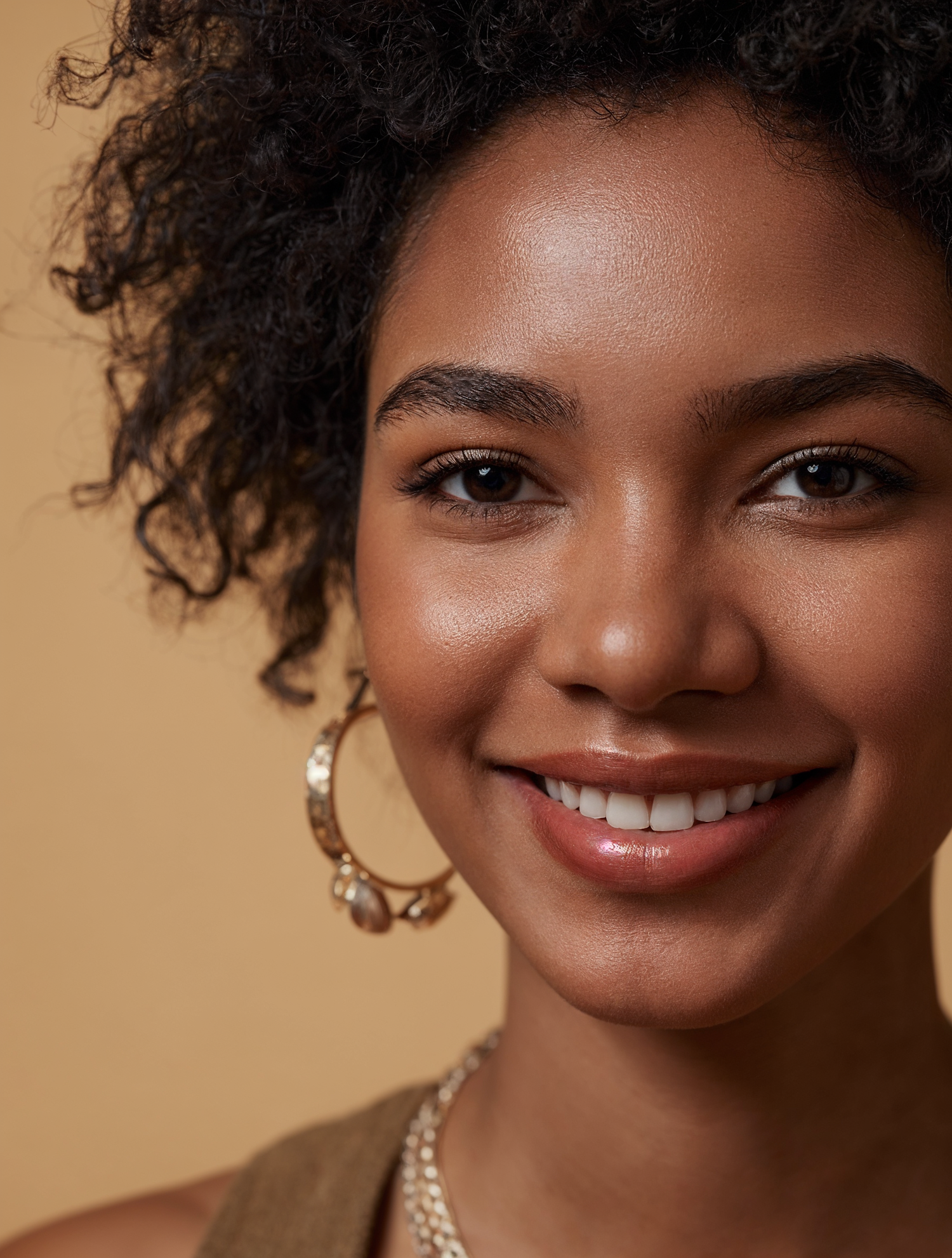Smiling Woman with Curly Hair