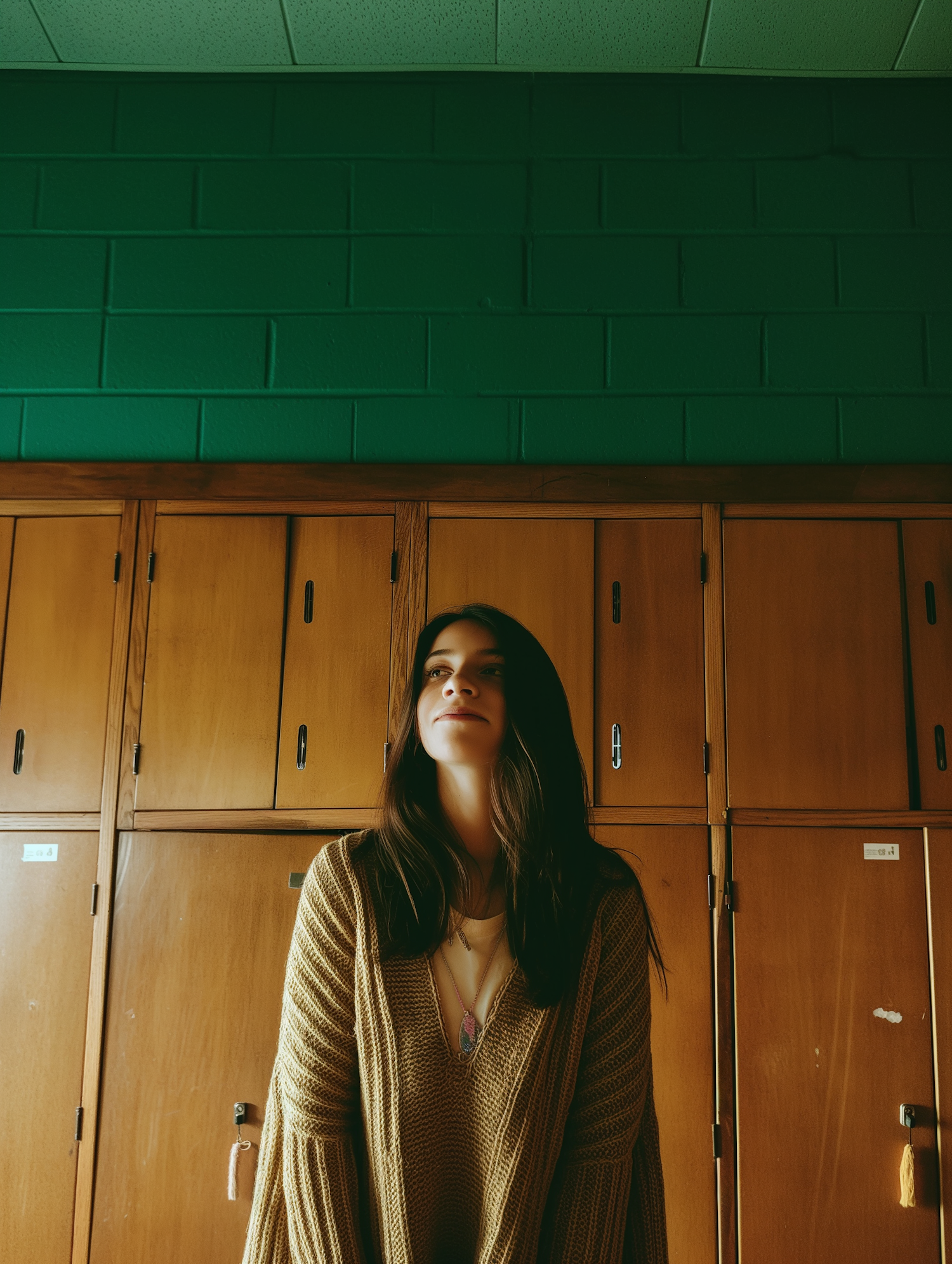 Contemplative Woman by Green Lockers