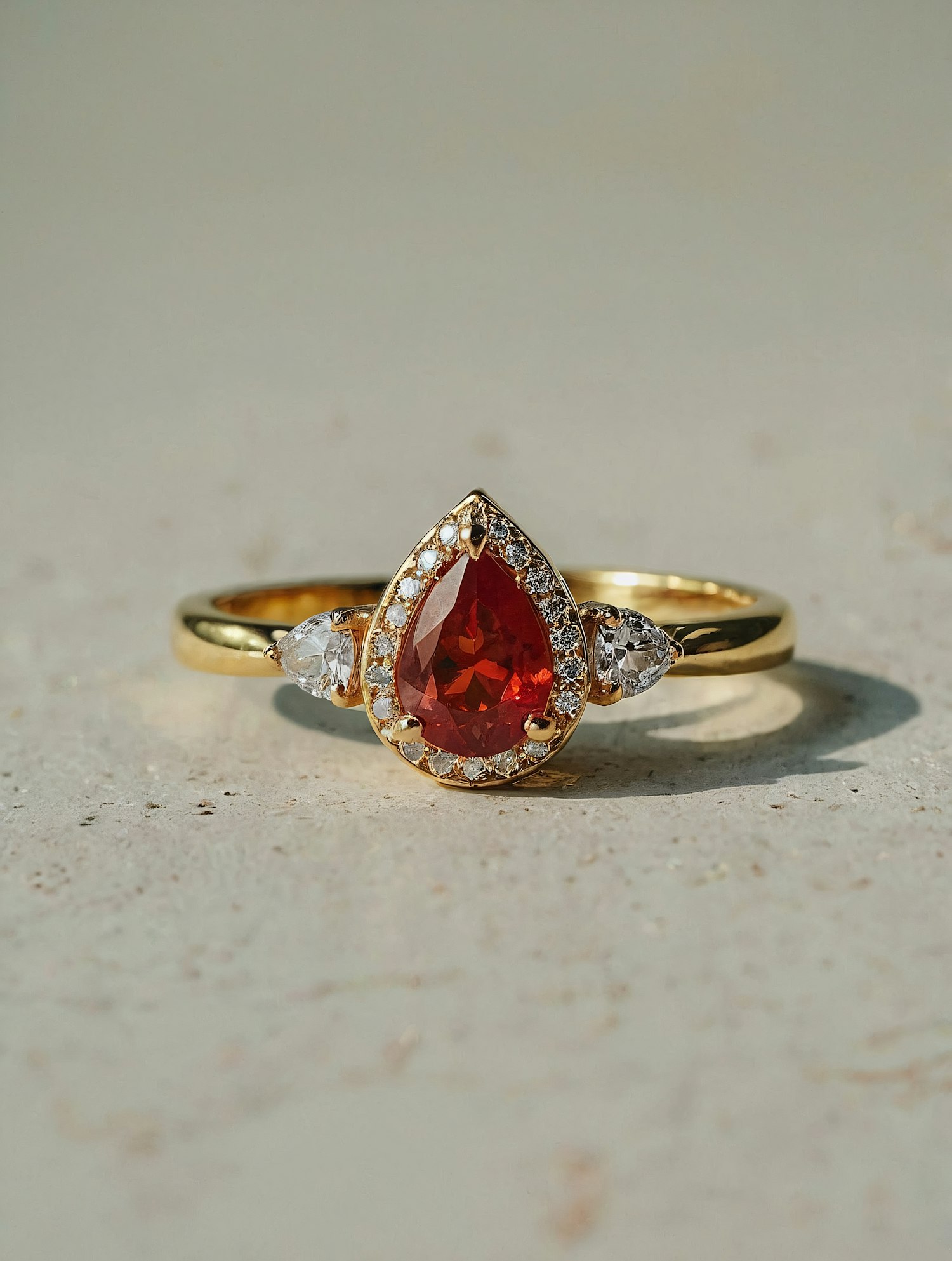 Elegant Gold Ring with Red Gemstone