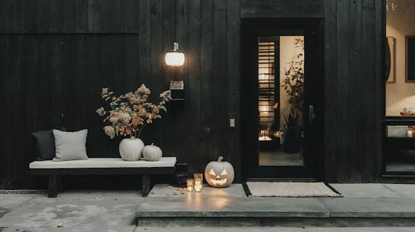 Twilight Home Entrance with Autumnal Decor