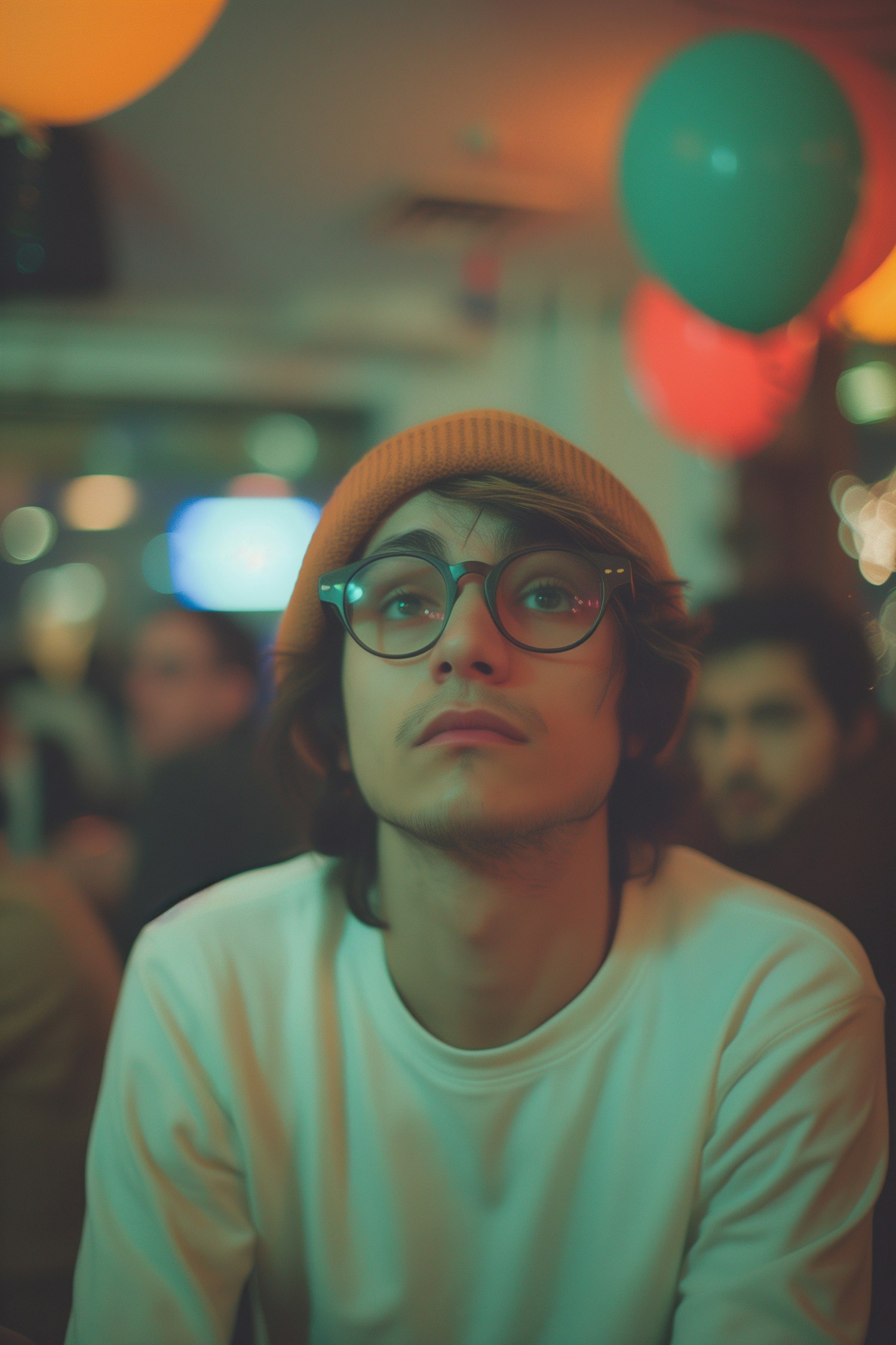 Contemplative Young Man at a Social Event