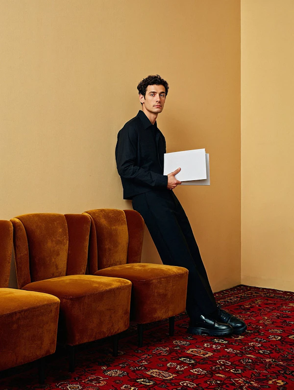 Man in Minimalist Room