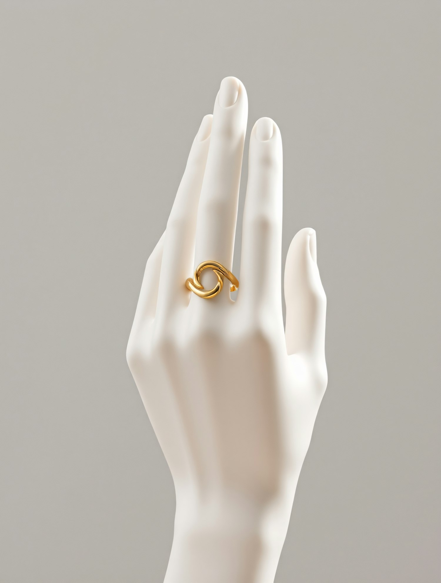 Elegant Gold Ring on Mannequin Hand