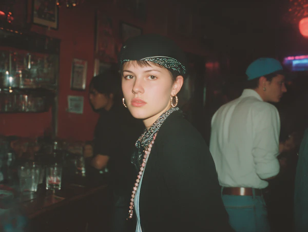 Woman in Dimly Lit Bar