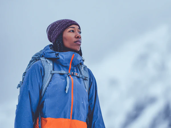 Hiker in Snowy Mountains