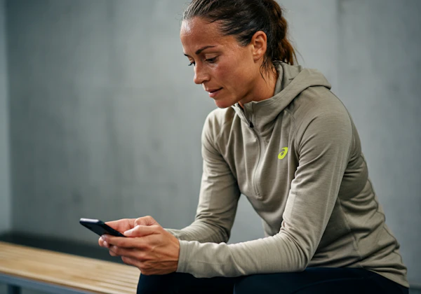 Woman on Bench with Phone