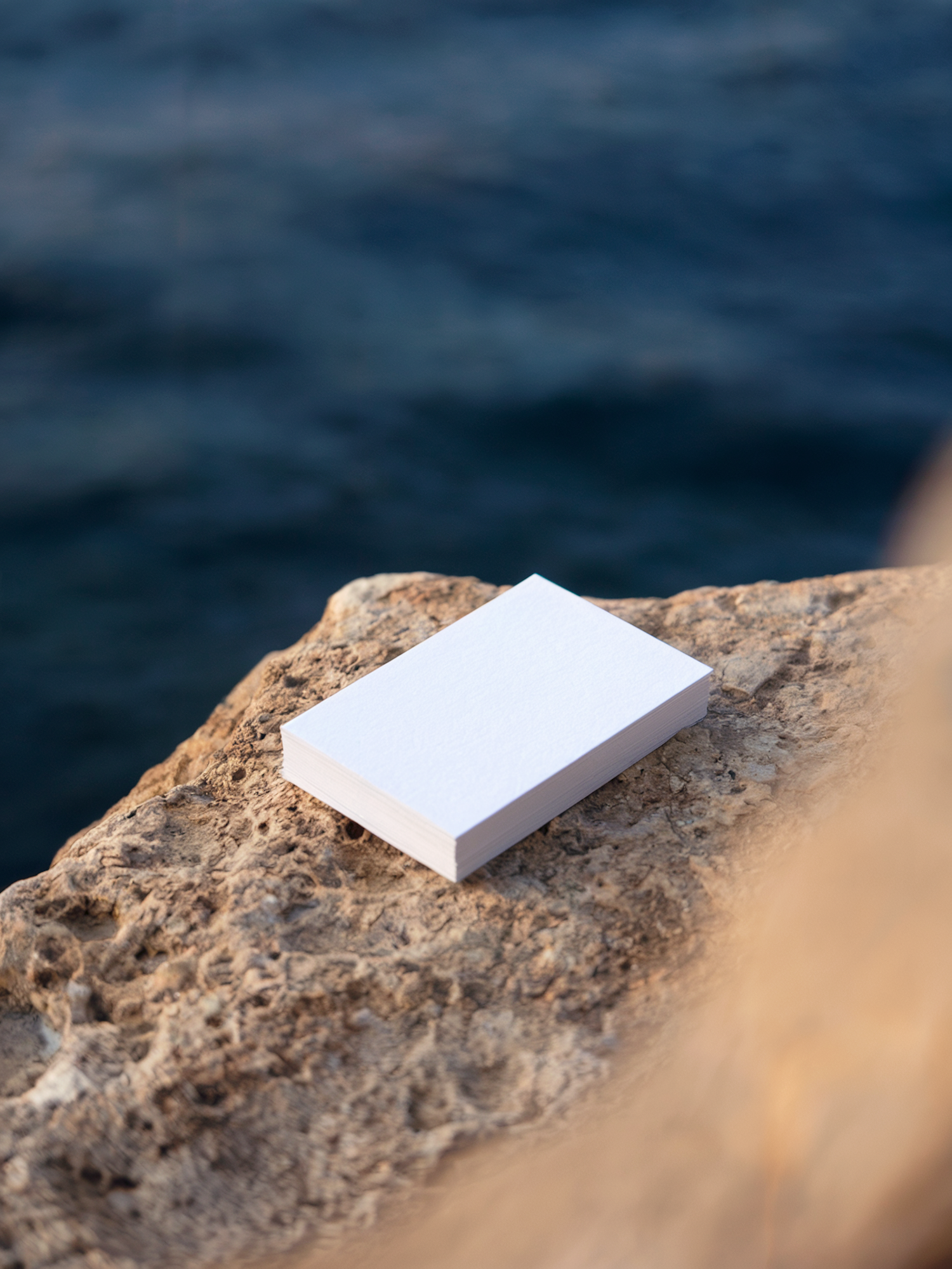 Cards on Rock by Water