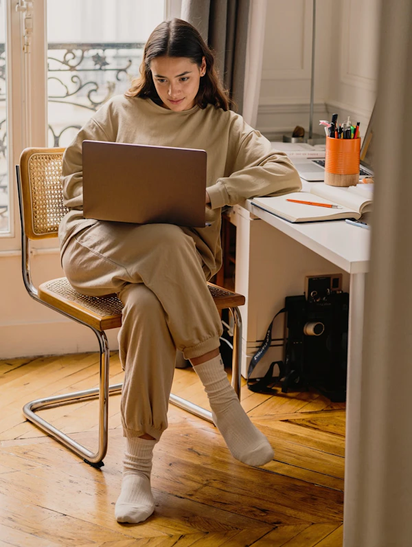 Woman Working by Window