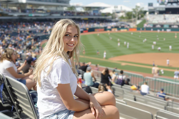 Woman at Baseball Game