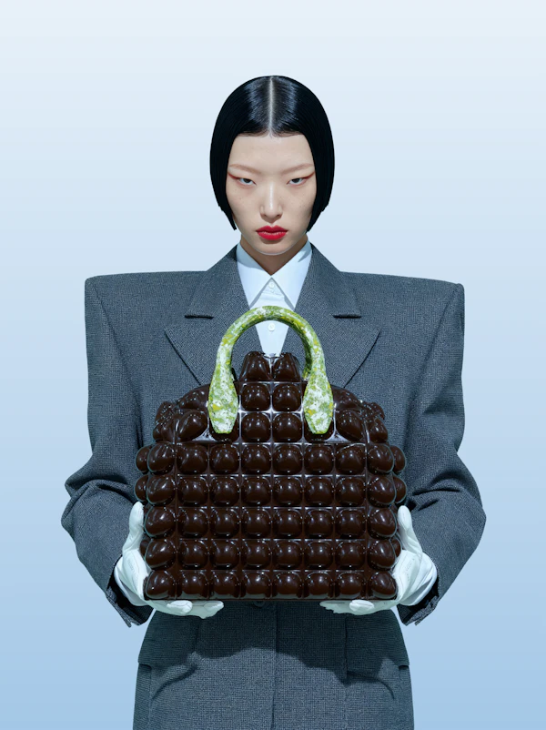 Elegant Portrait of Model Holding Brown Handbag