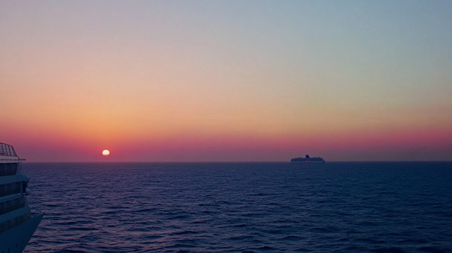 Serene Ocean Sunset with Cruise Ships