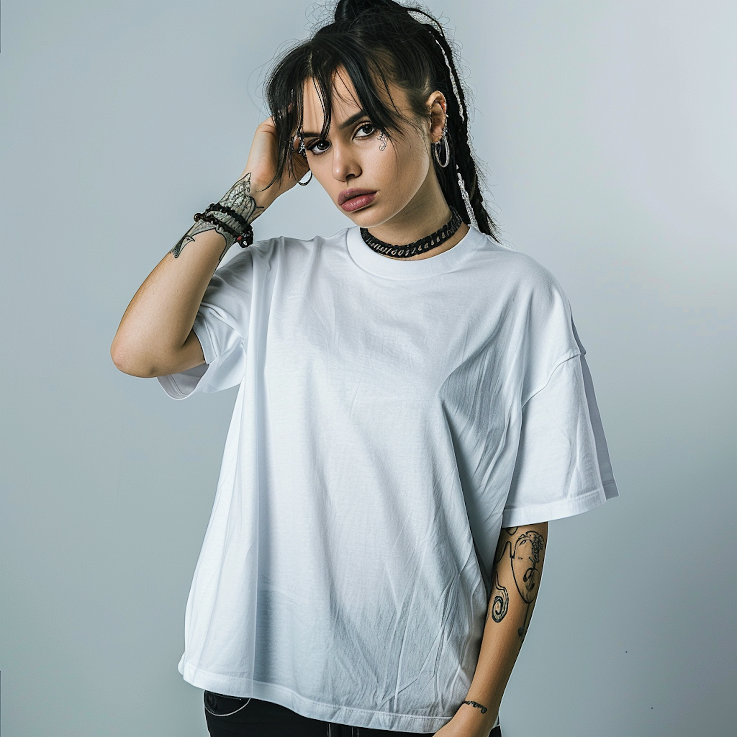 Introspective Woman with Tattoos