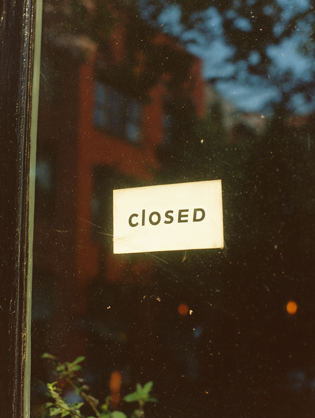 Closed Sign on Window