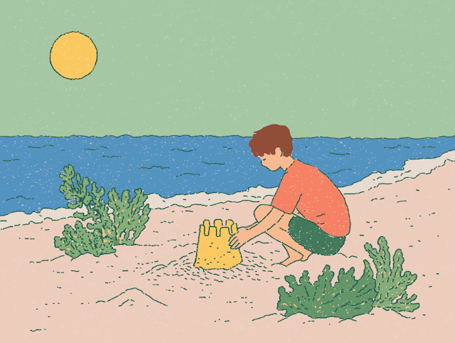 Boy Building Sandcastle