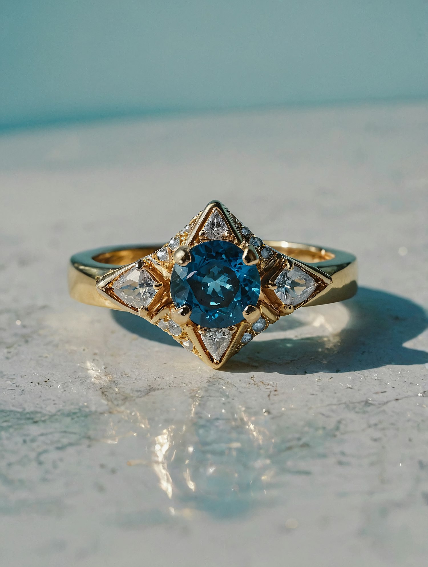 Elegant Gold Ring with Blue Gemstone