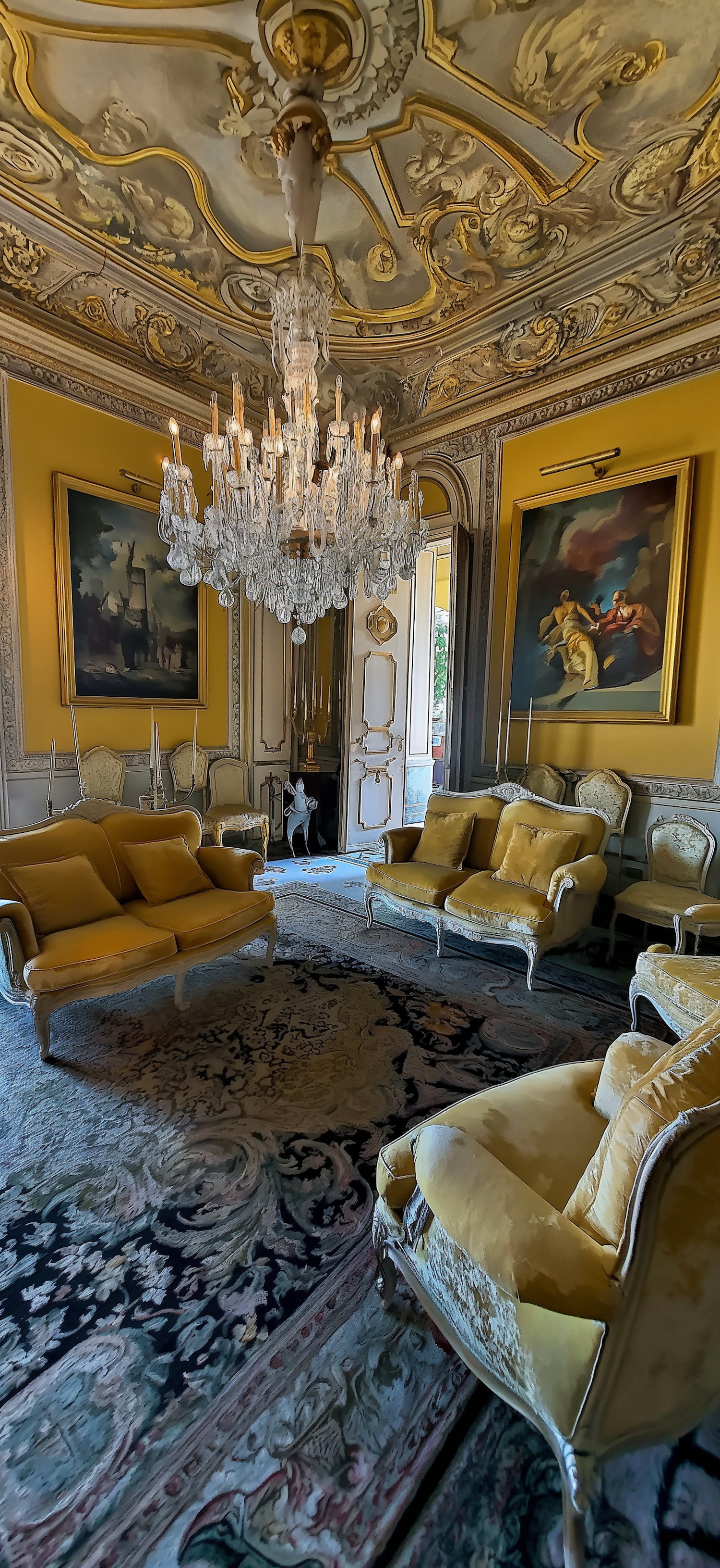 Opulent Room with Chandelier and Classical Frescoes