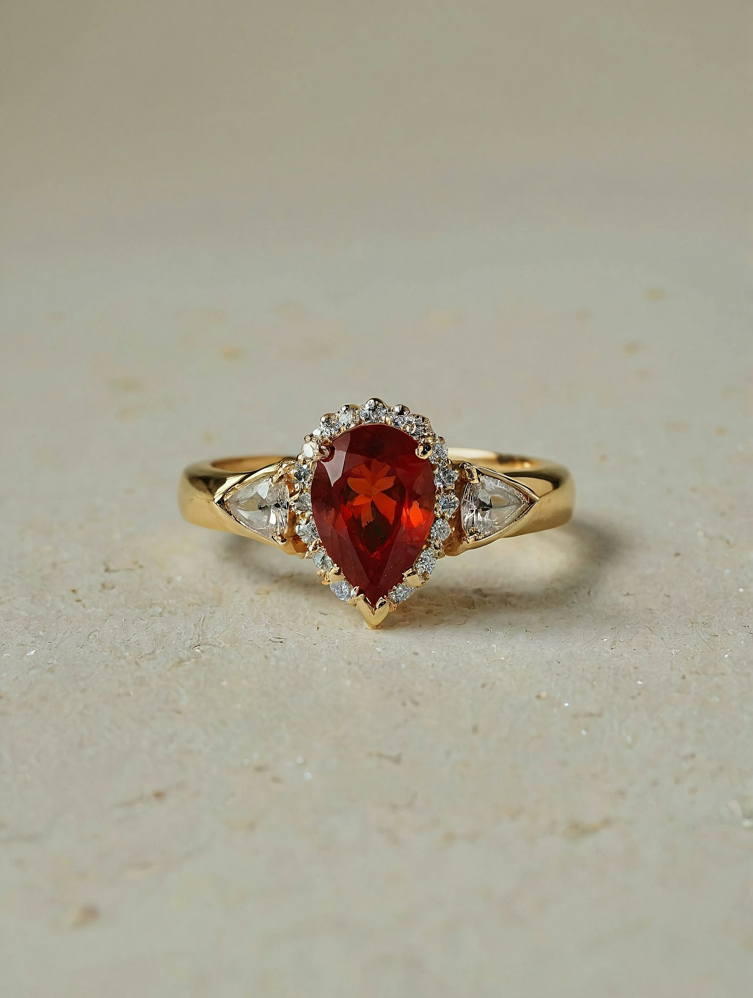 Elegant Gold Ring with Red Gemstone