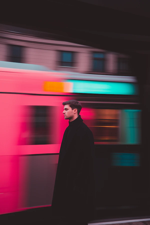 Man Walking Past Moving Train