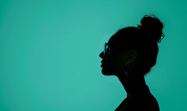 Silhouette of a Woman in Teal